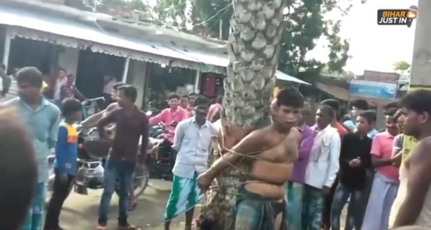印度医生遭强奸犯家属绑在树上殴打事件深度解析